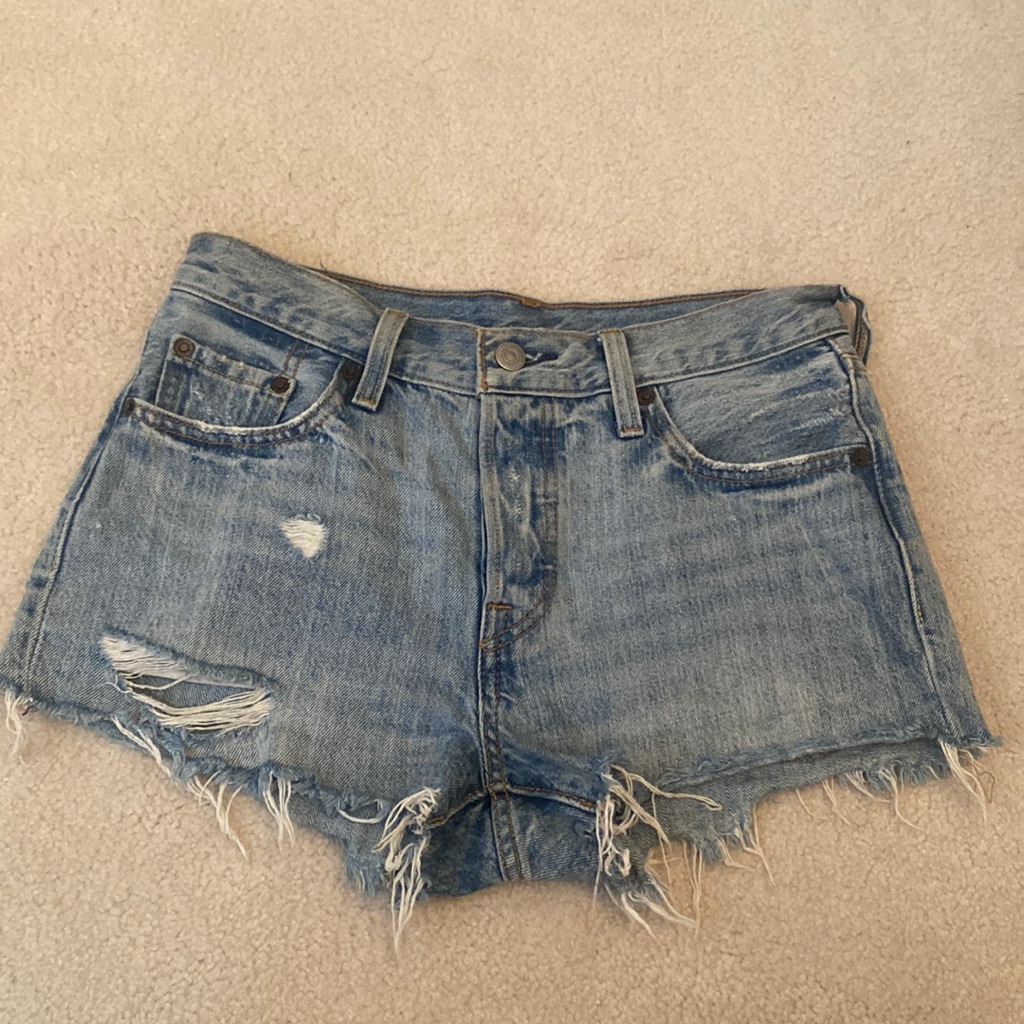 Levi’s 501 Jean Shorts. Light Wash. Slight Rips. Size 25